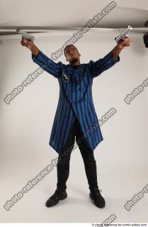 Garson STANDING POSE WITH GUNS 